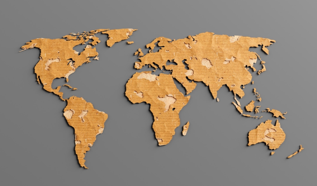 World map made of recycled cardboard paper.